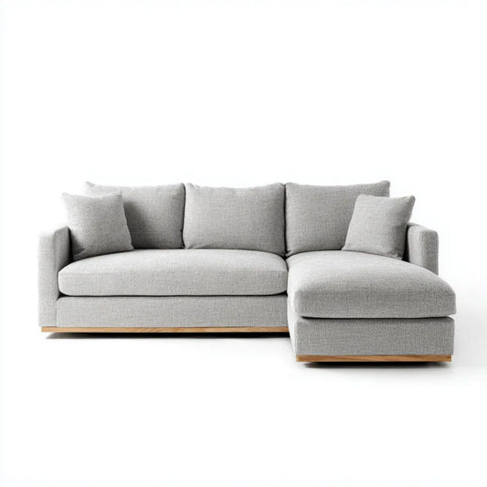 Jasnoszara sofa narożna w kształcie L z prawostronnym szezlongiem, tapicerowana poliestrem, 260 x 160 x 85 cm